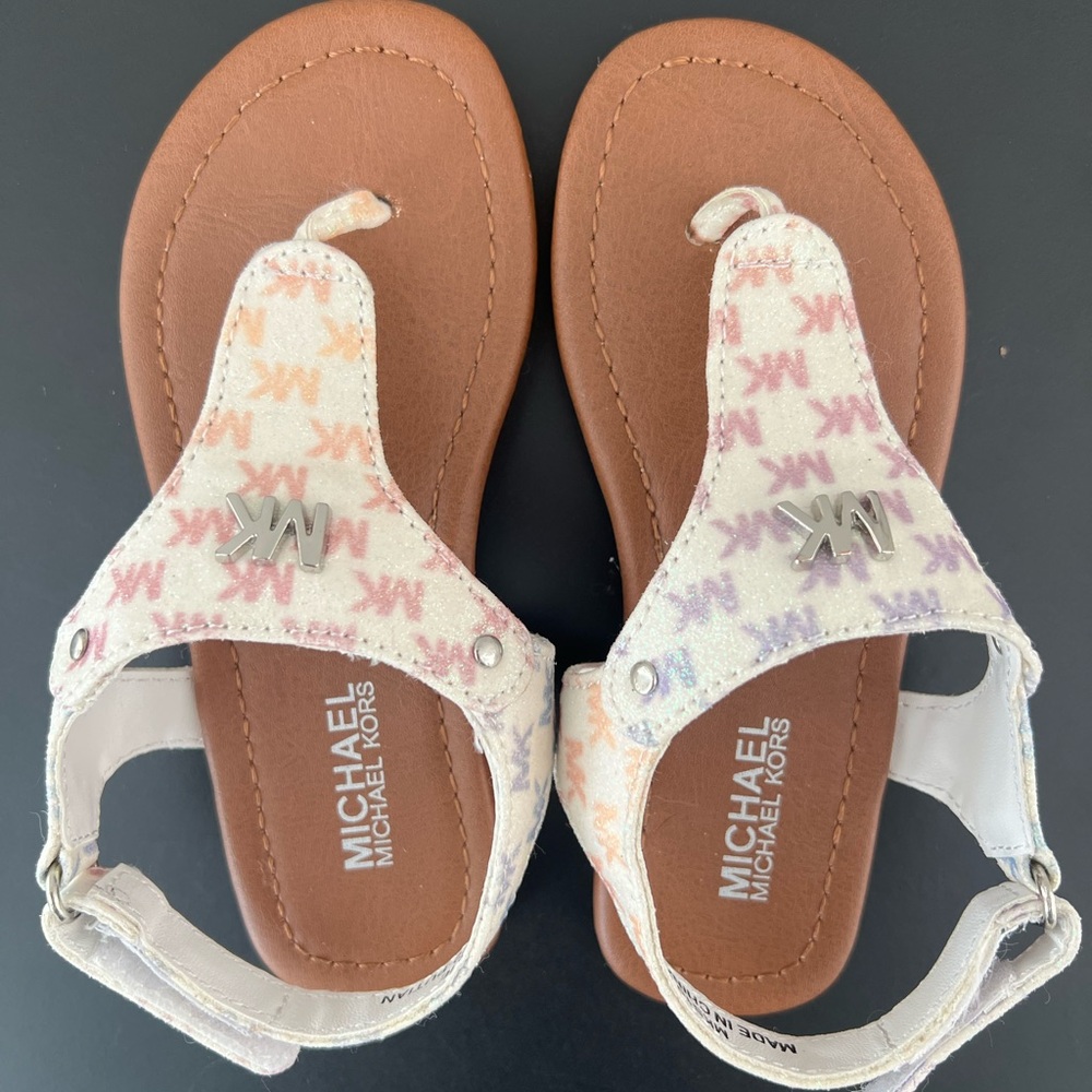 Toddler Girl White/Rainbow Logo Michael Kors Sandals, size 9
*NEVER WORN*
